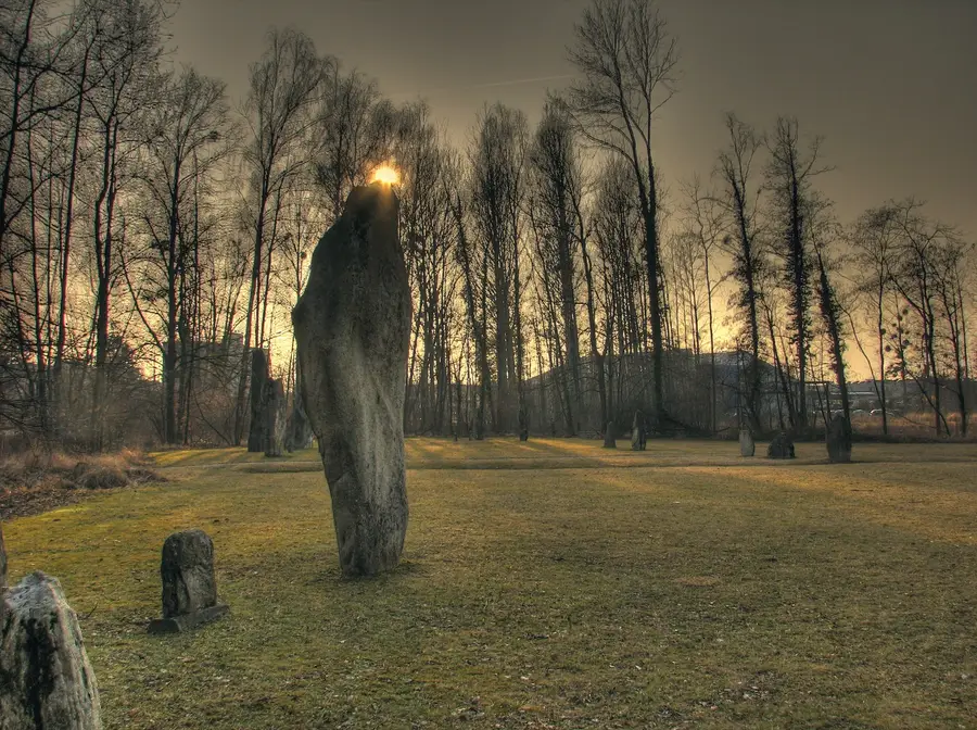 Low sun on a standing stone at the Clendy alignment