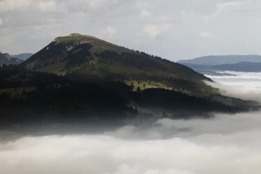 Le Suchet, seen across a sea of fog from the Dent de Vaulion
