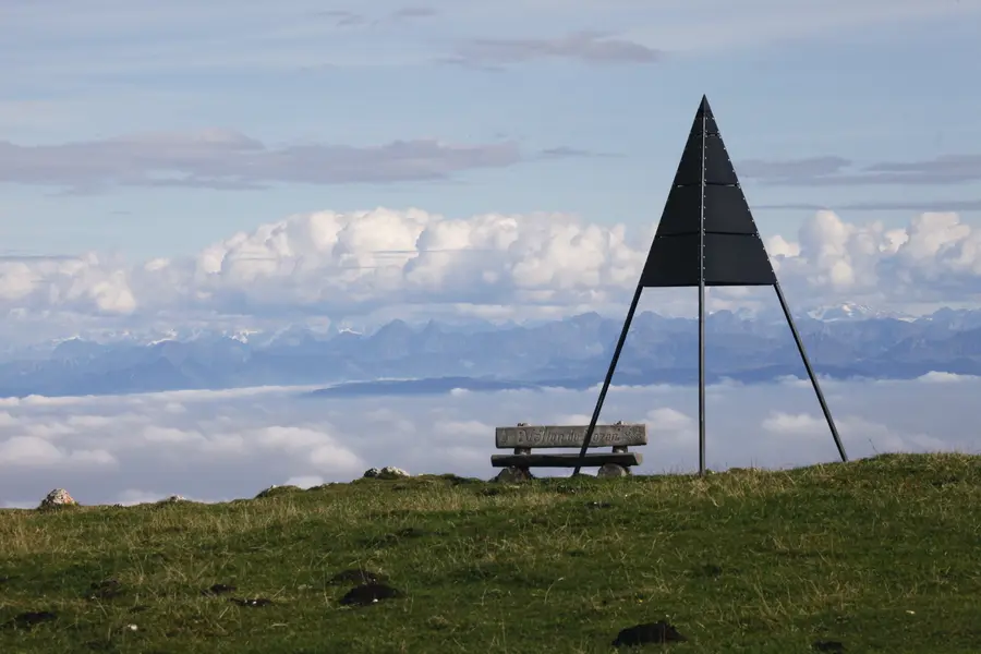 The summit of the Dent de Vaulion, the Alps beyond a sea of cloud