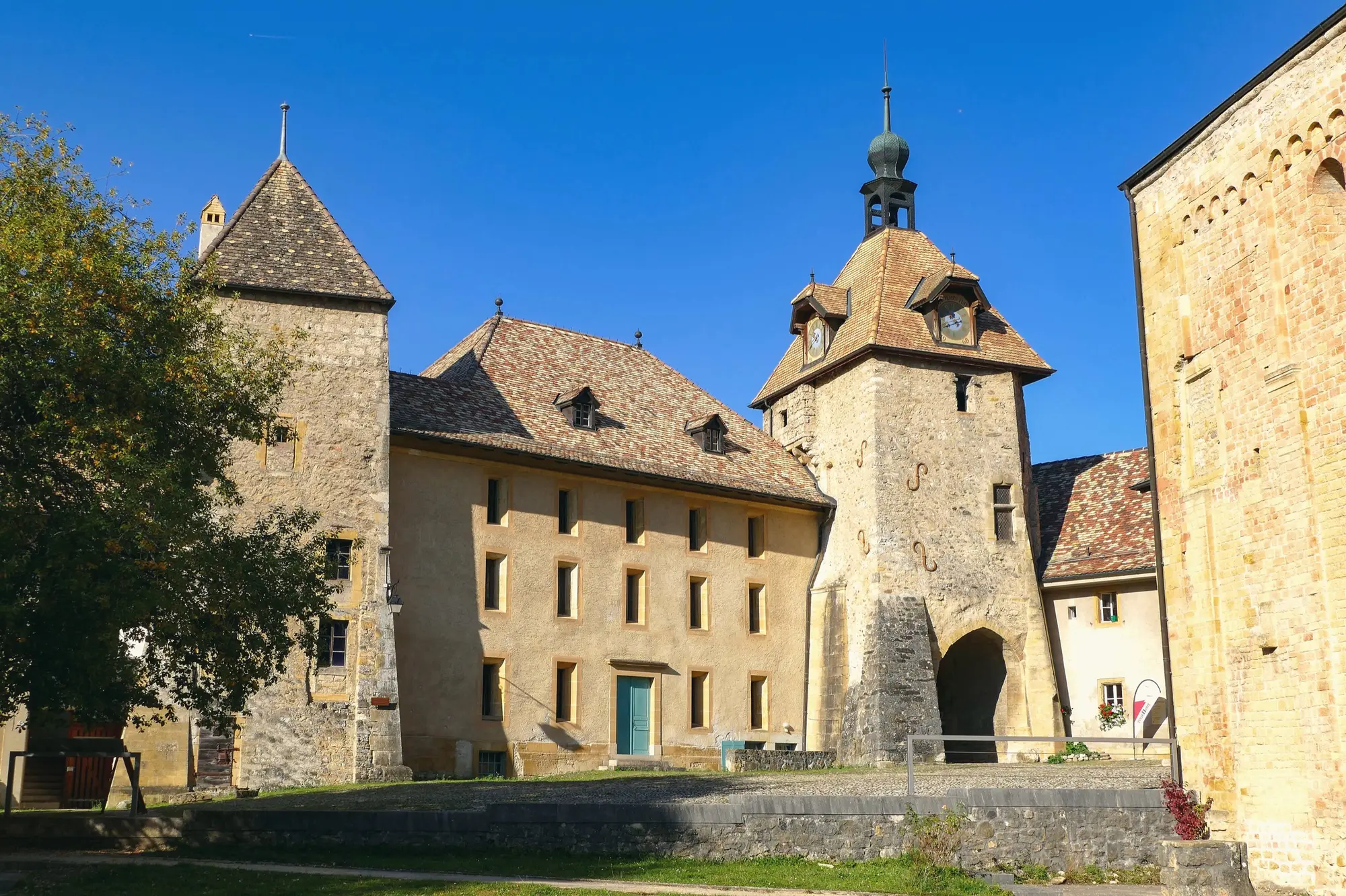 The abbey of Romainmôtier-Envy, in its Jura valley