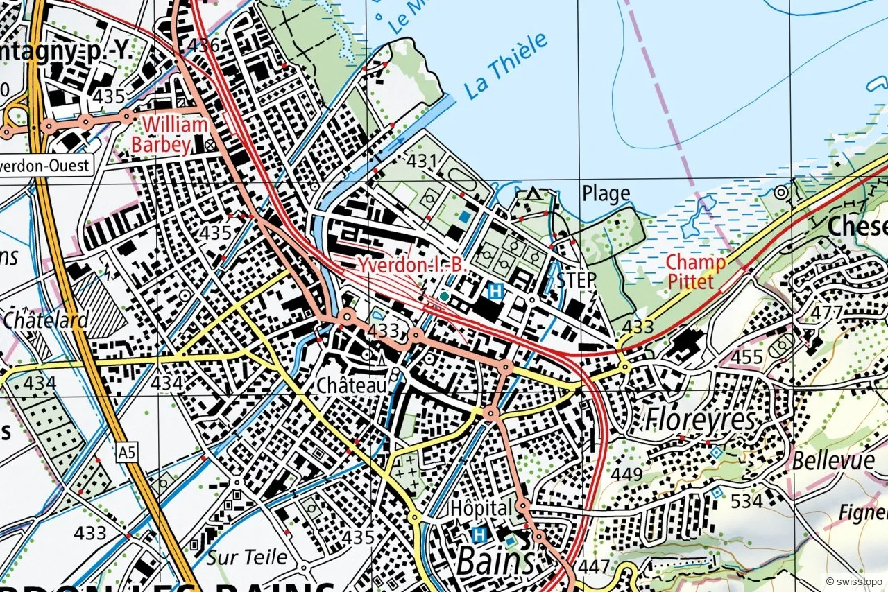 Town map of Yverdon-les-Bains showing the station, old town, castle, thermal baths and lake beach